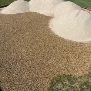 “Diamond" Bunker Sand Installed on Thelen 3/8” USGA Bridging Stone (Better Billy Bunker Drainage System)
